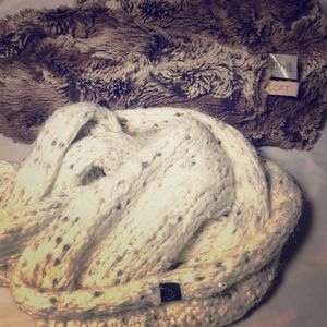 Two stylish infinity scarves.